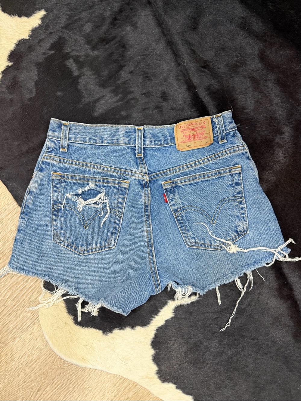 Levi's Medium Blue Distressed Denim Cutoff Shorts
